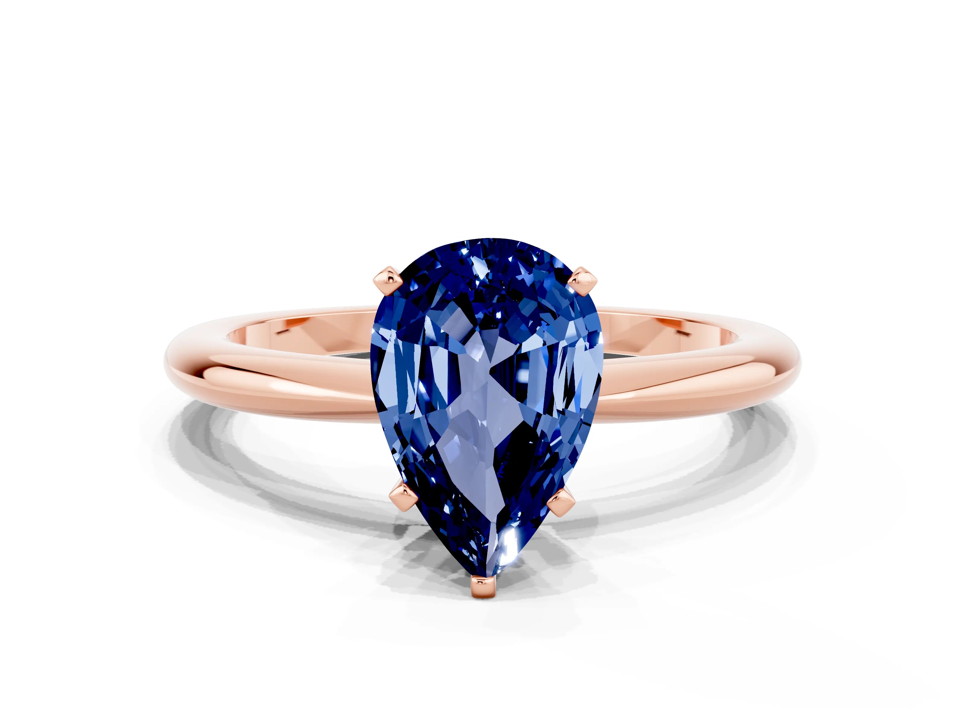 Rose gold Pear Cut Blue Sapphire Solitaire Ring with Six-Prong Setting and Classic Band