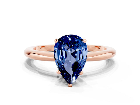 Rose gold Pear Cut Blue Sapphire Solitaire Ring with Six-Prong Setting and Classic Band