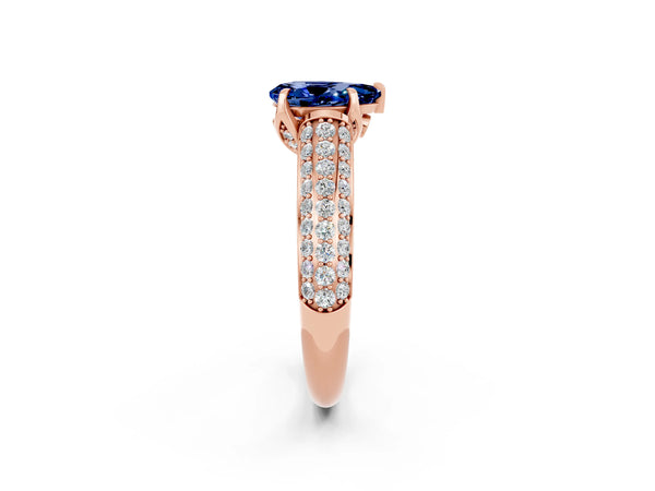 Rose gold Pear Cut Blue Sapphire Solitaire Ring with Three-Row Pavé Band and Four-Prong Setting