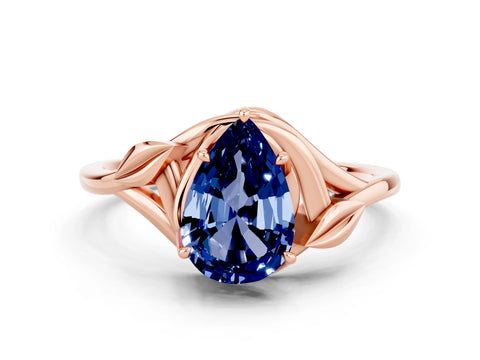 Rose gold Pear Cut Blue Sapphire Solitaire Ring with Twist Band and Four-Prong Setting_24