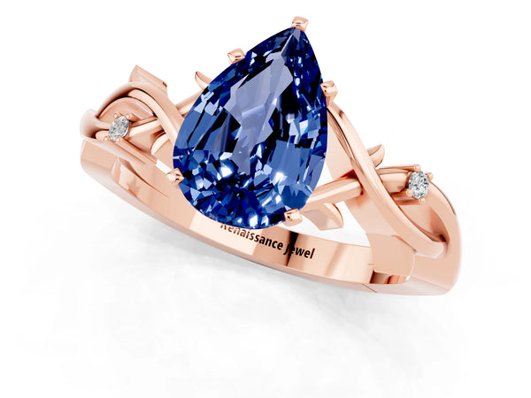 Rose gold Pear Cut Blue Sapphire Solitaire Ring with Twisted Band and Prong Setting