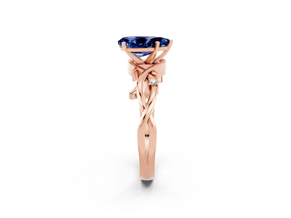 Rose gold Pear Cut Blue Sapphire Solitaire Ring with Twisted Band and Prong Setting