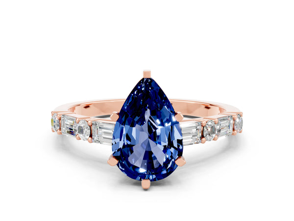 Rose gold Pear Cut Blue Sapphire Solitaire with Side Baguettes and Channel Set Band