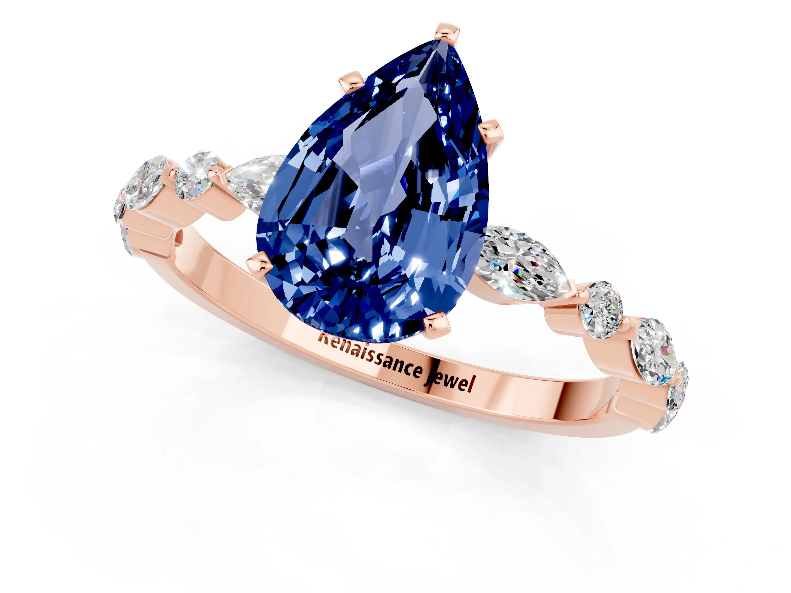 Rose gold Pear Cut Blue Sapphire Solitaire with Side Stones on a Pavé Band and Four-Prong Setting_1