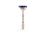 Rose gold Pear Cut Blue Sapphire Solitaire with Side Stones on a Pavé Band and Four-Prong Setting_2