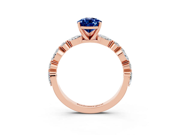 Rose gold Pear Cut Blue Sapphire Ring with Marquise and Round  Side Stones and Four-Prong Setting