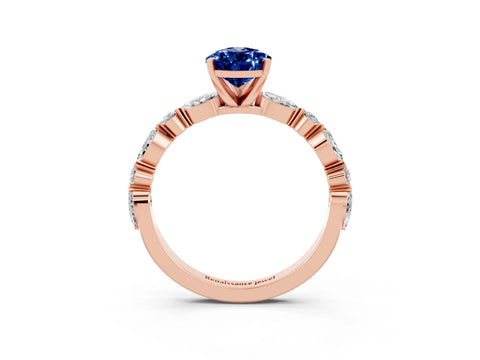 Rose gold Pear Cut Blue Sapphire Solitaire with Side Stones on a Pavé Band and Four-Prong Setting_3