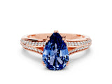 Rose gold Pear Cut Blue Sapphire Split Shank Engagement Ring with Pavé Band