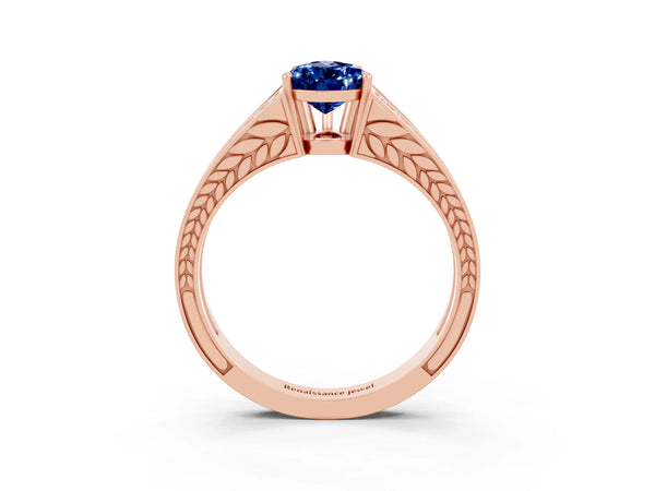 Rose gold Pear Cut Blue Sapphire Split Shank Ring with Pavé Band and Four-Prong Setting