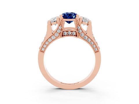 Rose gold Pear Cut Blue Sapphire Three-Stone Ring with Channel Set Band and Four-Prong Setting_3