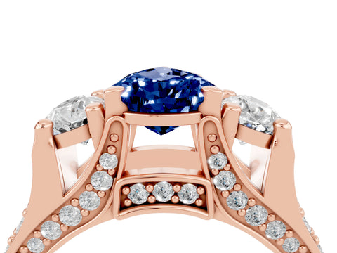 Rose gold Pear Cut Blue Sapphire Three-Stone Ring with Channel Set Band and Four-Prong Setting_4
