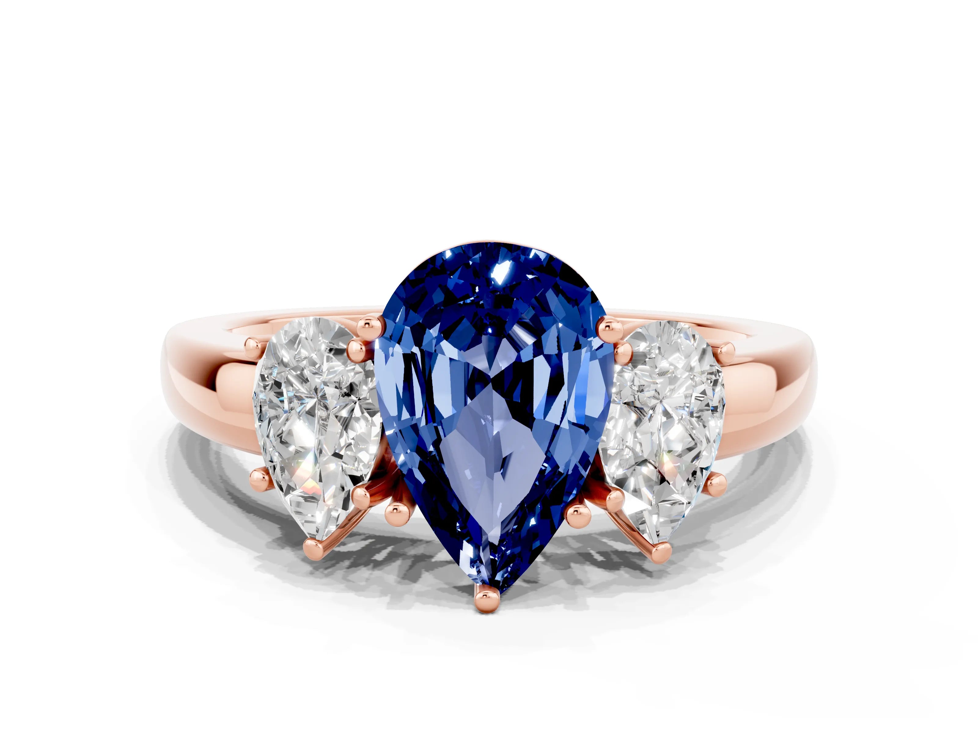 Rose gold Pear Cut Blue Sapphire Three-Stone Ring with Four-Prong Setting and Classic Band