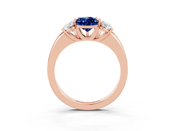 Rose gold Pear Cut Blue Sapphire Three-Stone Ring with Four-Prong Setting and Classic Band