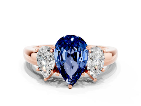 Rose gold Pear Cut Blue Sapphire Three-Stone Ring with Four-Prong Setting and Classic Band