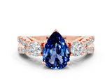 Rose gold Pear Cut Blue Sapphire Three-Stone Ring with Pavé Split Shank and Four-Prong Setting_12