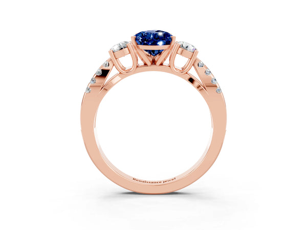 Rose gold Pear Cut Blue Sapphire Three-Stone Ring with Pavé Split Shank and Four-Prong Setting