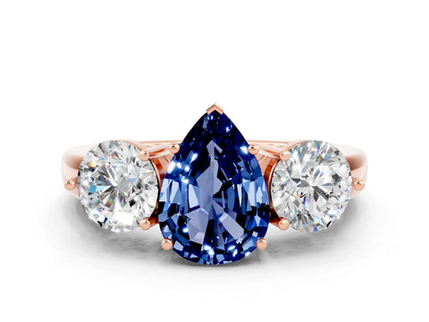 Rose gold Pear Cut Blue Sapphire Three-Stone Ring with Prong Setting and Classic Band