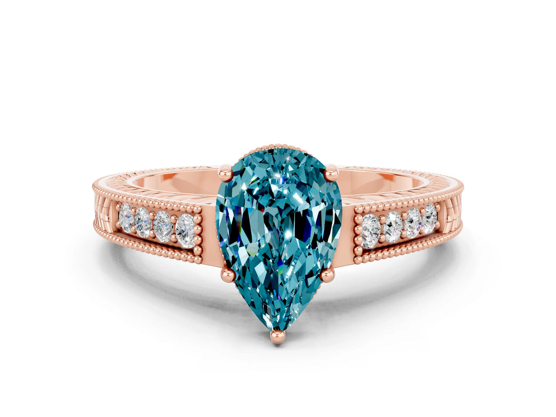 Rose gold Pear Cut Blue Topaz Engagement Ring with Milgrain Channel Set Band and Prong Setting