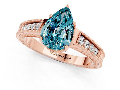 Rose gold Pear Cut Blue Topaz Engagement Ring with Milgrain Channel Set Band and Prong Setting_1