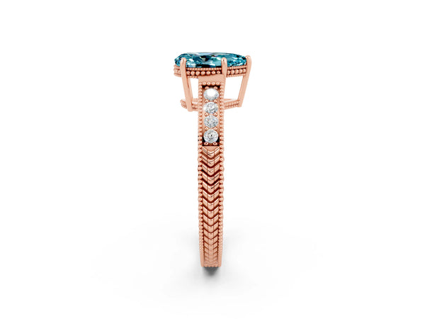 Rose gold Pear Cut Blue Topaz Engagement Ring with Milgrain Channel Set Band and Prong Setting