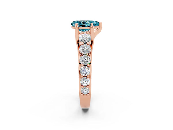 Rose gold Pear Cut Blue Topaz Engagement Ring with Pavé Band and Four-Prong Setting