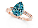 Rose gold Pear Cut Blue Topaz Engagement Ring with Side Stone Accents and Four-Prong Setting_61