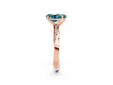 Rose gold Pear Cut Blue Topaz Engagement Ring with Side Stone Accents and Four-Prong Setting_62