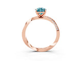 Rose gold Pear Cut Blue Topaz Engagement Ring with Side Stone Accents and Four-Prong Setting_63