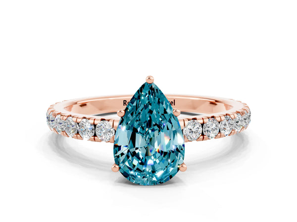Rose gold Pear Cut Blue Topaz Pavé Solitaire Engagement Ring with Four-Prong Setting