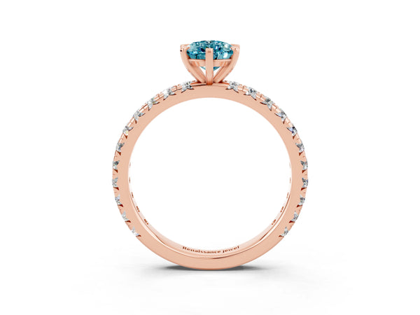 Rose gold Pear Cut Blue Topaz Pavé Solitaire Ring with Round Band and Prong Setting