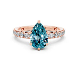 Rose gold Pear Cut Blue Topaz Pavé Solitaire Ring with Round Band and Prong Setting_24