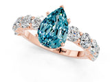 Rose gold Pear Cut Blue Topaz Prong Setting with Side Stones on a Pave Band_1