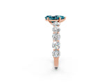 Rose gold Pear Cut Blue Topaz Prong Setting with Side Stones on a Pave Band_2