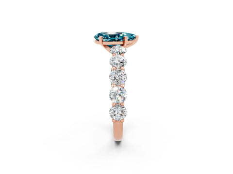 Rose gold Pear Cut Blue Topaz Prong Setting with Side Stones on a Pave Band_2