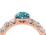 Rose gold Pear Cut Blue Topaz Prong Setting with Side Stones on a Pave Band_4