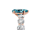 Rose gold Pear Cut Blue Topaz Prong Setting with Side Stones on a Pave Band_5