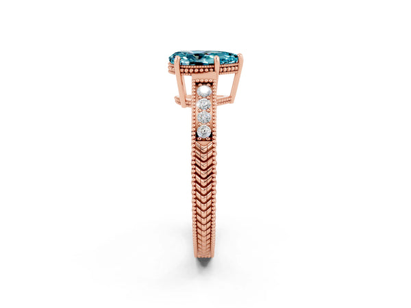 Rose gold Pear Cut Blue Topaz Ring with Milgrain Pavé Band and Four-Prong Setting
