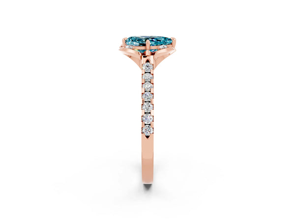 Rose gold Pear Cut Blue Topaz Ring with Pavé Band and Floral Prong Setting