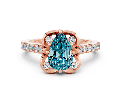 Rose gold Pear Cut Blue Topaz Ring with Pavé Band and Floral Prong Setting