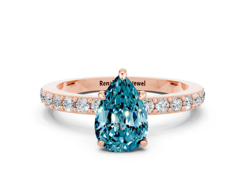Rose gold Pear Cut Blue Topaz Ring with Pavé Band and Four-Prong Setting