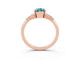 Rose gold Pear Cut Blue Topaz Ring with Side Stones and Four-Prong Setting_39