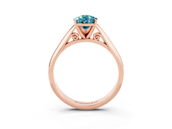 Rose gold Pear Cut Blue Topaz Solitaire Engagement Ring with Cathedral Setting and Four-Prong Mount