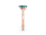 Rose gold Pear Cut Blue Topaz Solitaire Engagement Ring with Cathedral Setting and Four-Prong Mount_20