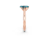 Rose gold Pear Cut Blue Topaz Solitaire Engagement Ring with Cathedral Setting and Four-Prong Mount_26