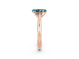 Rose gold Pear Cut Blue Topaz Solitaire Engagement Ring with Cathedral Setting and Four-Prong Mount_80