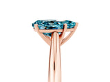 Rose gold Pear Cut Blue Topaz Solitaire Engagement Ring with Cathedral Setting and Four-Prong Mount_83