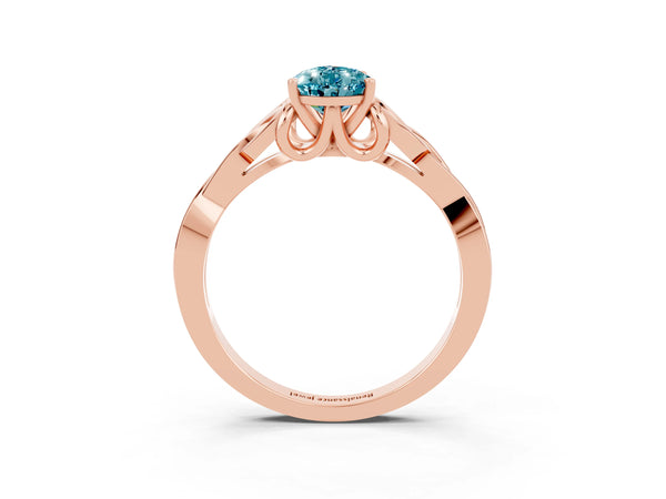 Rose gold Pear Cut Blue Topaz Solitaire Engagement Ring with Celtic Knot Band and Four-Prong Setting