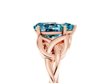 Rose gold Pear Cut Blue Topaz Solitaire Engagement Ring with Celtic Knot Band and Four-Prong Setting_5