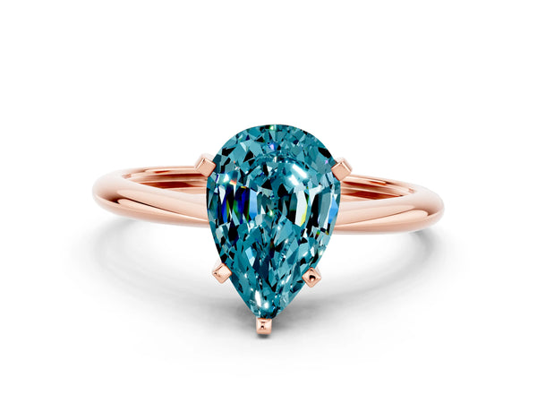 Rose gold Pear Cut Blue Topaz Solitaire Engagement Ring with Classic Band and Four-Prong Setting