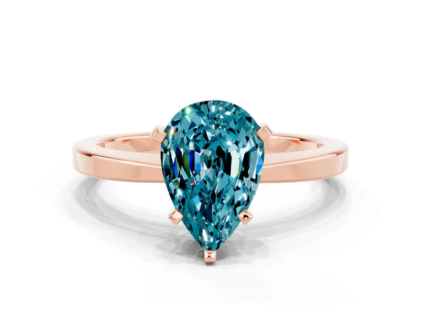 Rose gold Pear Cut Blue Topaz Solitaire Engagement Ring with Classic Band and Four-Prong Setting